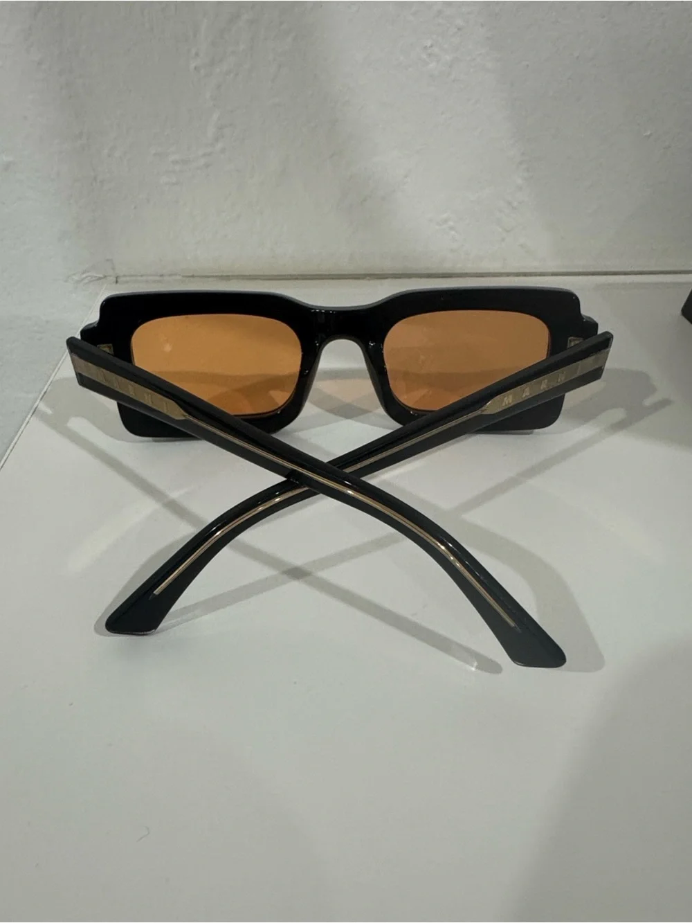 Marni Black Frame Sunglasses with Amber Lenses